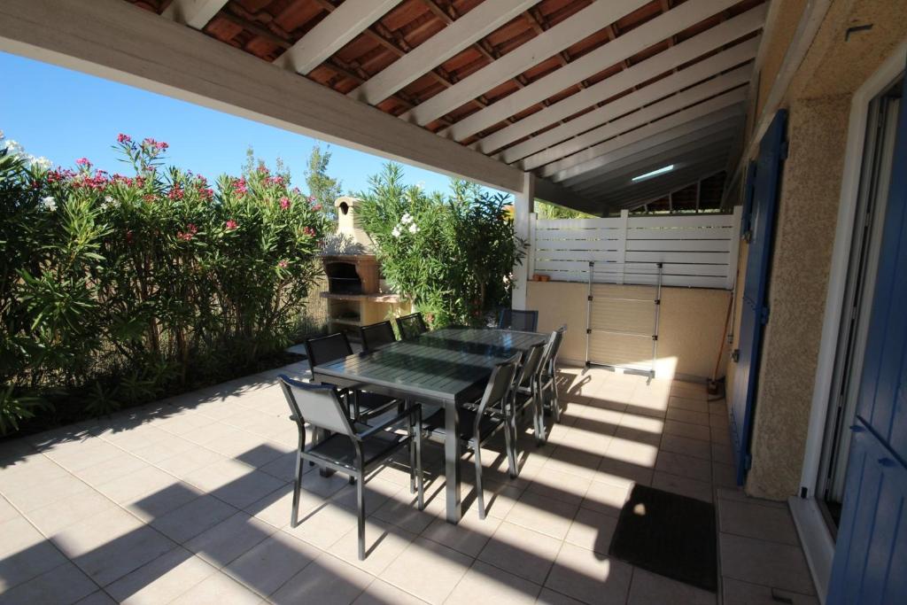 Belle villa climatisée, wifi, 3 chambres grande terrasse vue réserve naturelle dans résidence sécurisée avec piscine commune 800m de la mer Un vrai Havre de Paix LRCS107 - 1