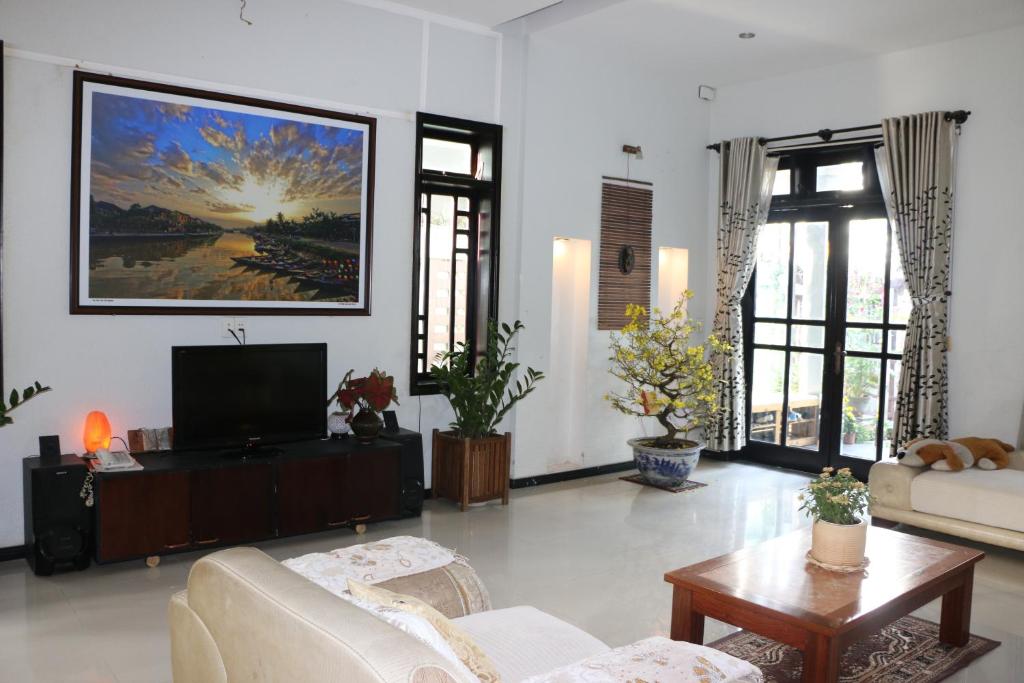 Shared lounge/TV area, Green CoCo HomeStay in Hoi An