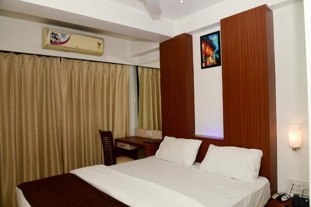 Hotel Monarch Center Point near Dahanu Beach, Bordi photo