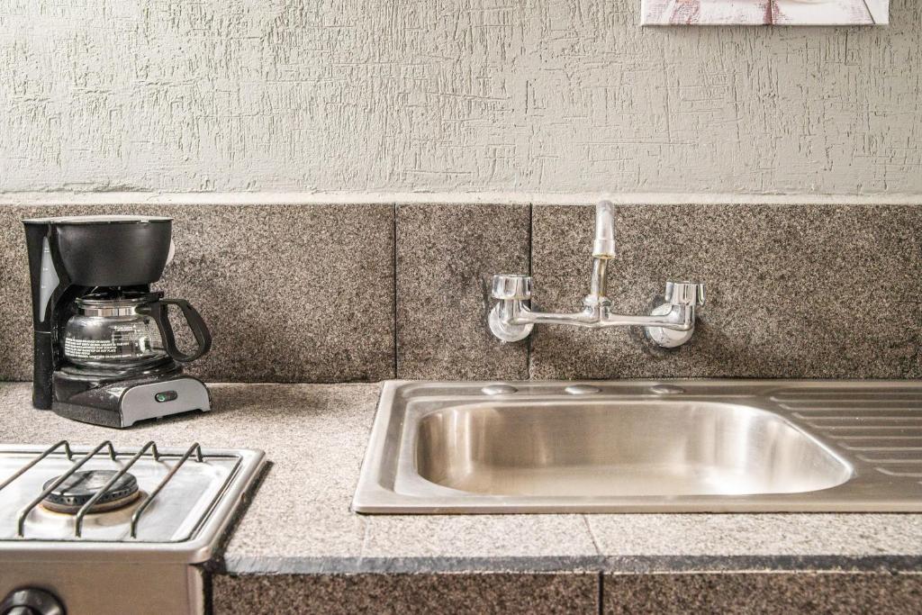 Kitchen, Hotel Dpas 52 in Merida