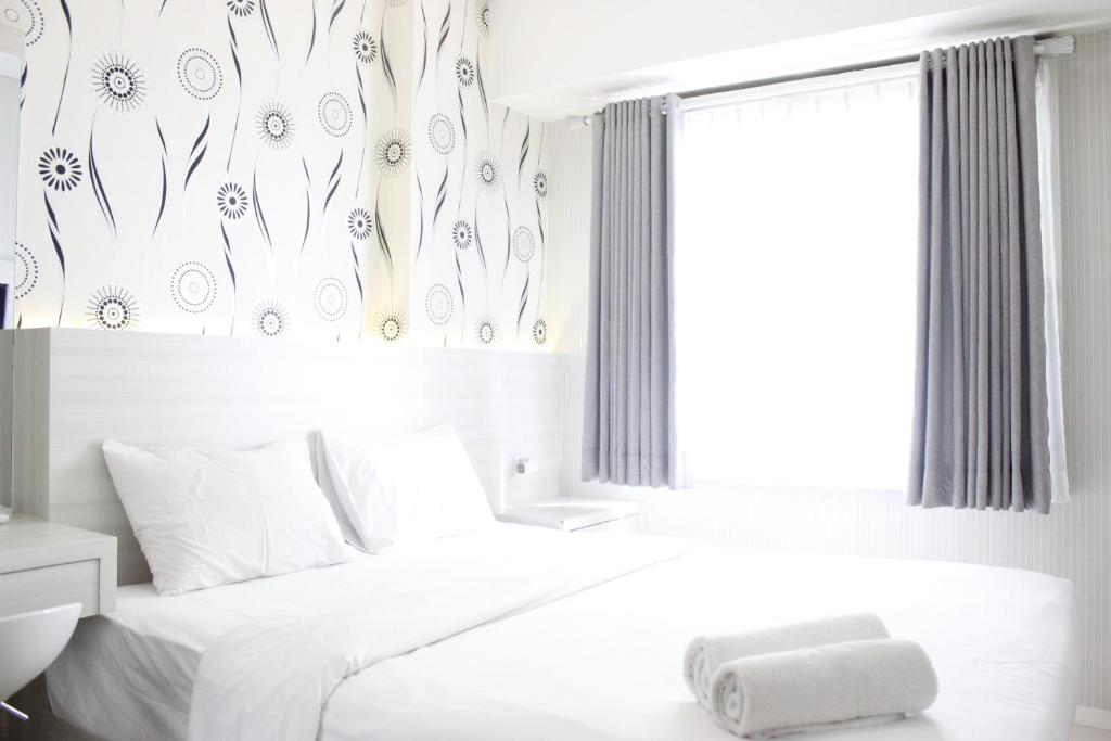 Relaxing 1BR Apartment at Parahyangan Residence near Cihampelas By Travelio, Bandung