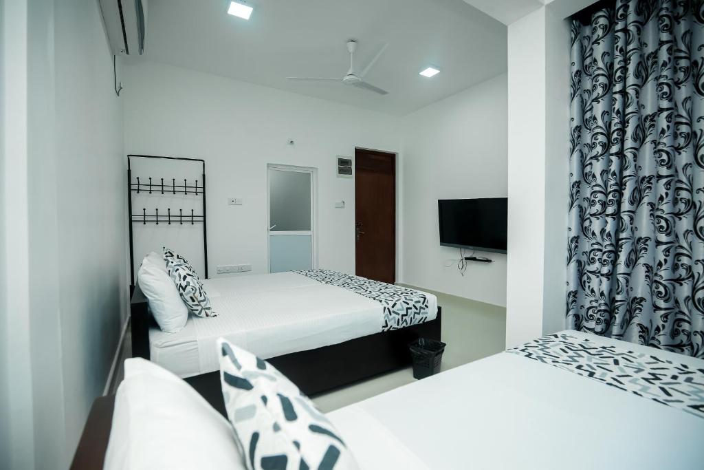 Deluxe Triple Bed Room with Balcony
