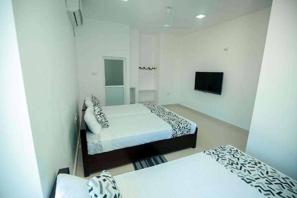 Bilik Deluxe Katil Triple