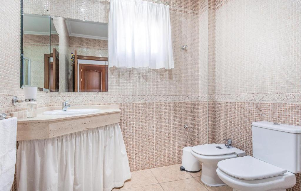 Nice home in Gelves with 3 Bedrooms and WiFi photo