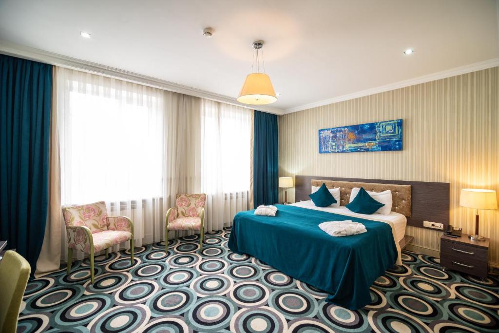 Almaty Mildom Hotel room