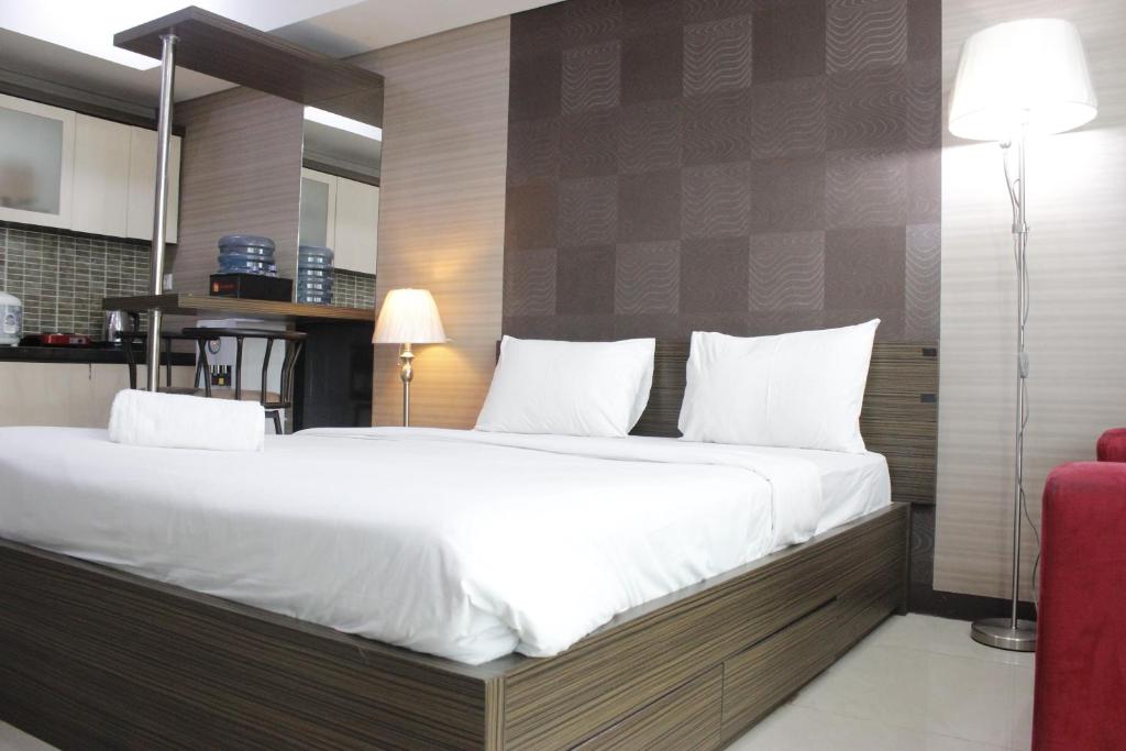 Prime and Comfy Studio at Tamansari La Grande Apartment By Travelio, Bandung