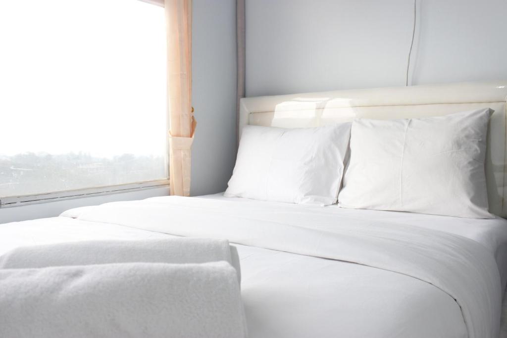 Modest 2BR Apartment at The Jarrdin Cihampelas By Travelio, Bandung