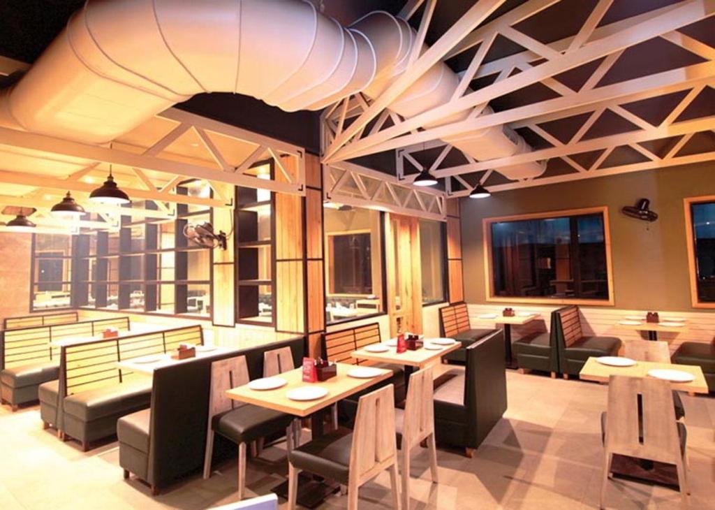 Restaurant, Sharanam Green Resort in Goa