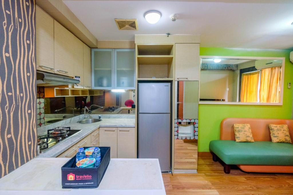 찔란닥의 38m² 침실 2개 프라이빗 욕실 1개 Homey & Comfy 2BR Apt Kebagusan City By Travelio 전경
