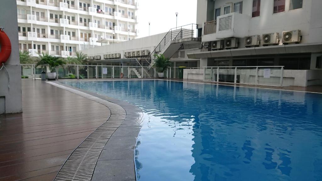 Sentul Tower Apartment by Kozy Room
