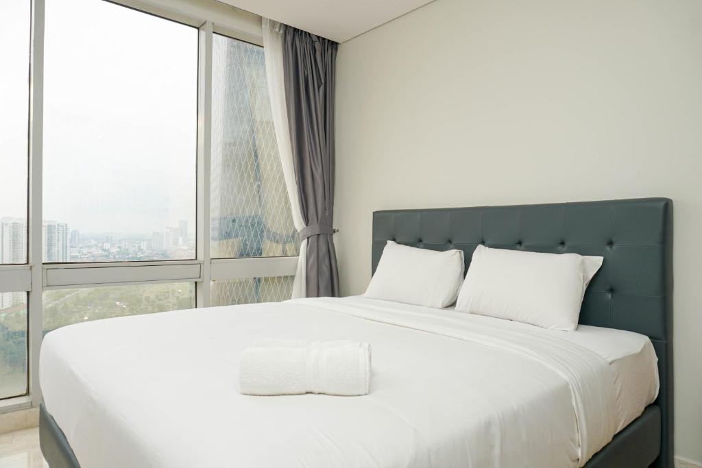Elegant 2BR at Empyreal The Epicentrum Kuningan Apartment By Travelio, Jakarta