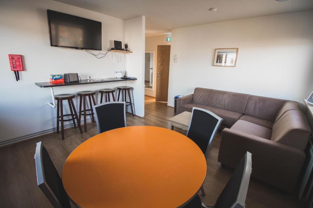 Shared lounge/TV area, Ormurinn Guesthouse in Egilsstadir