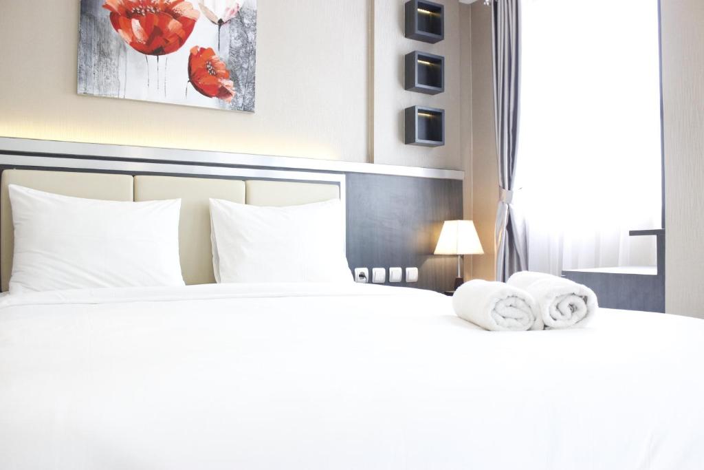 Convenient 1BR Gateway Pasteur Apartment By Travelio, Bandung