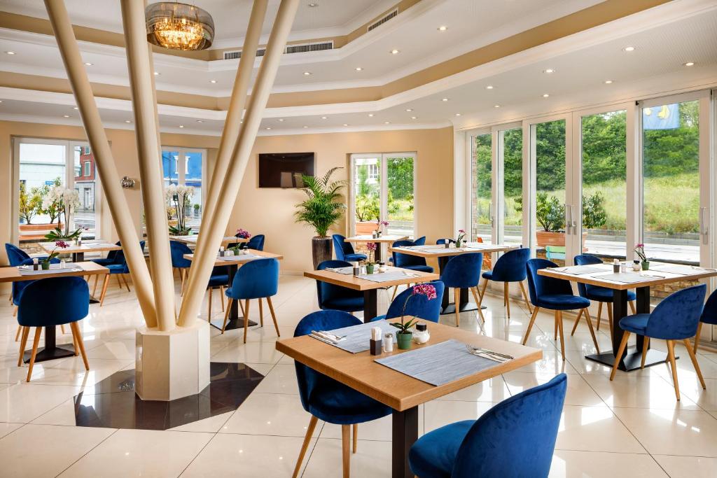 Hotel Tivoli의 깔끔한 객실 내부 이미지