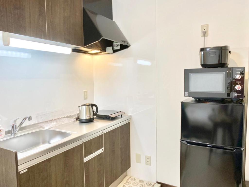 이시가키의 아파트먼트 24m² 침실 1개 프라이빗 욕실 1개 Court MORE 전경