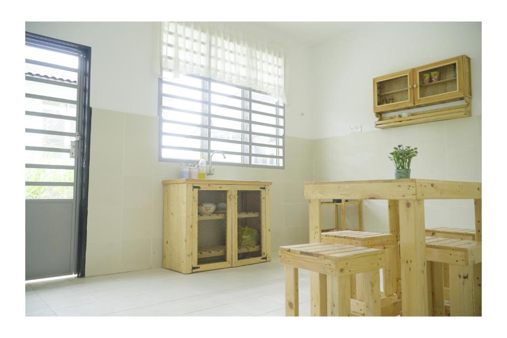 Cozy, Spacious, Air Cond UMP Gambang Homestay -- The Pigeon Guest House photo