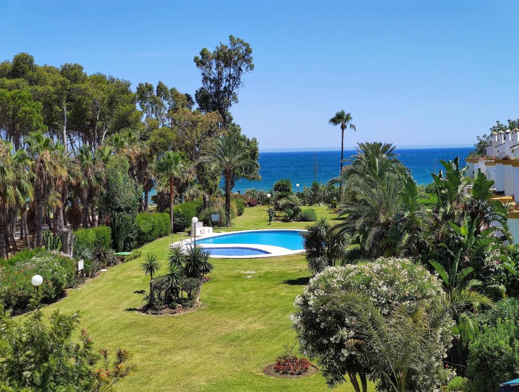 Spacious Beachfront Town House in Estepona with Fully Equipped Kitchen, Pools, Garden, Sea View - 1