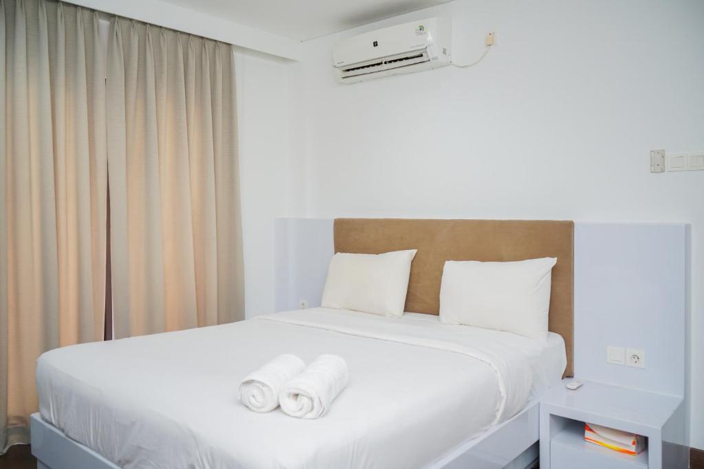 Homey and Modern Tamansari Semanggi 2BR Apartment By Travelio, Jakarta