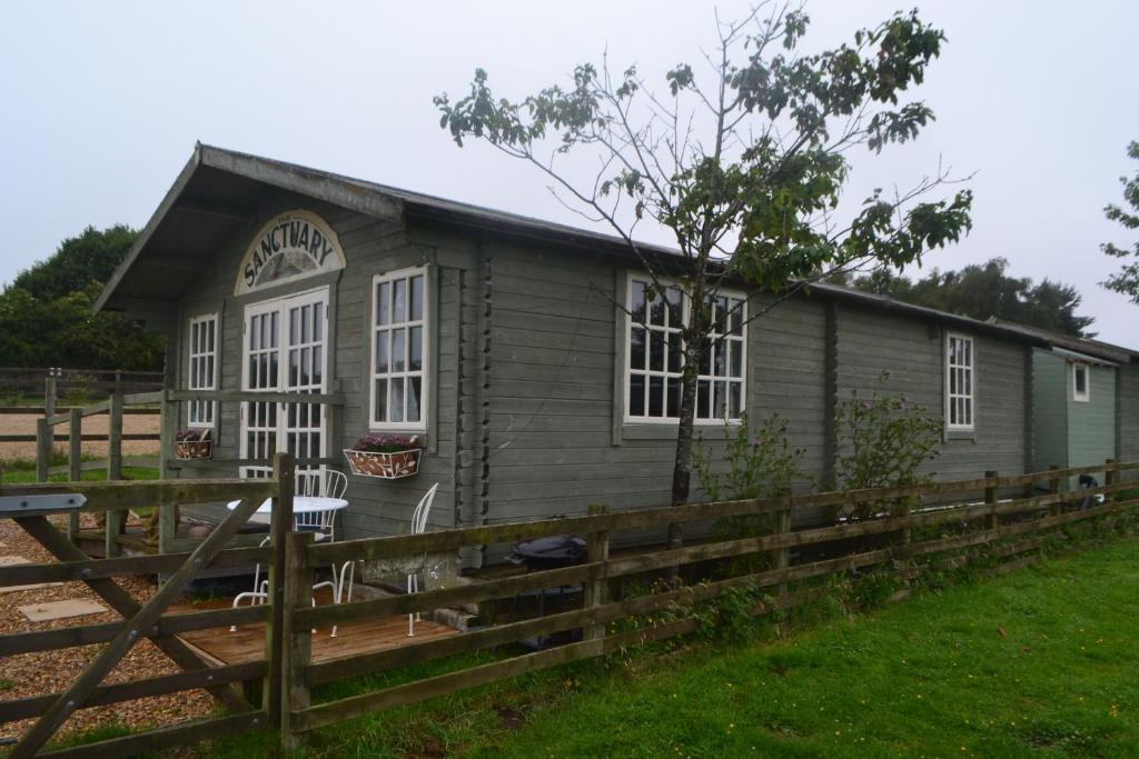 Peaceful Log Cabin next to Horse Field photo
