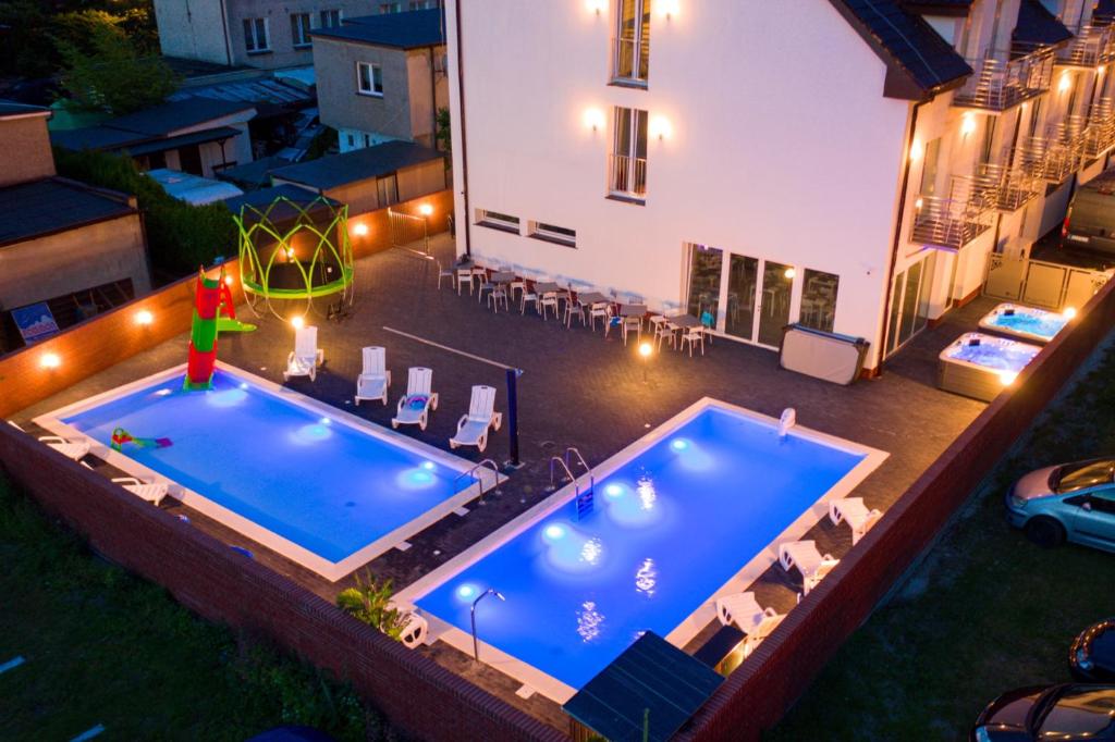 Noclegi Pobierowo | Pod Winogronem Apartamenty z basenem i wyżywieniem