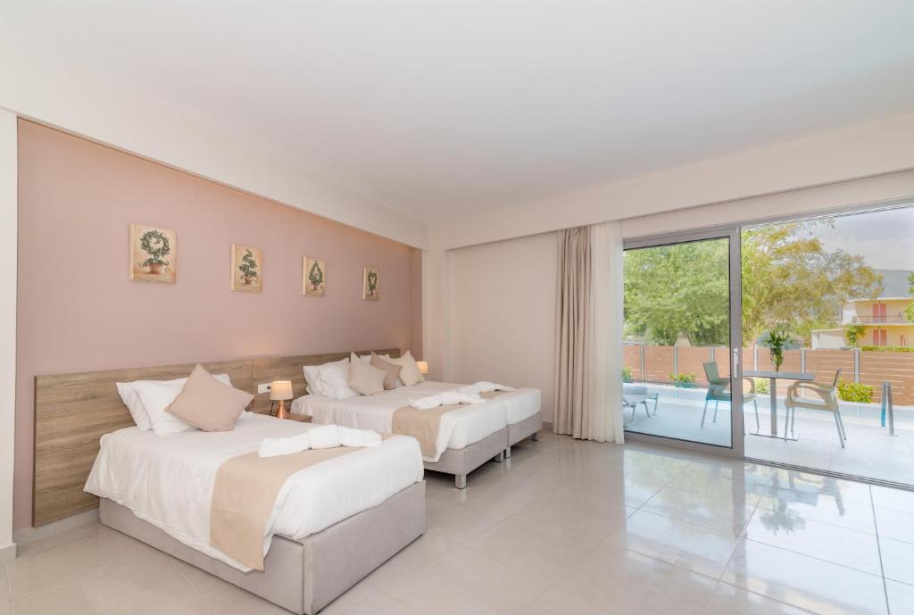 Poseidon Beach Hotel — Hotel rooms in Laganas, Ionian Islands