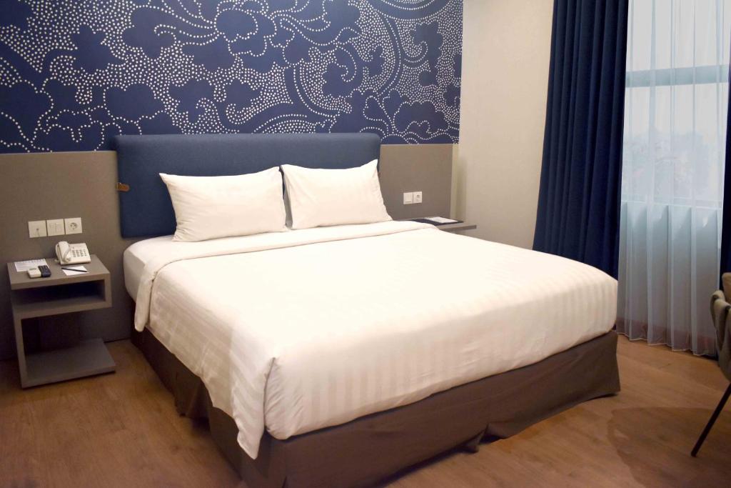 Luminor Hotel Airport Sidoarjo by WH photo