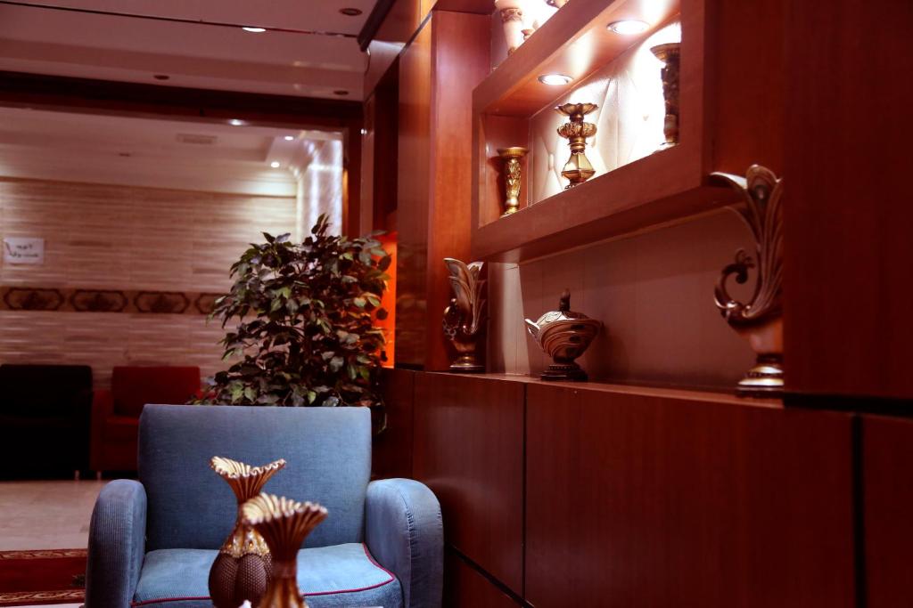 By Quiet Rooms ركن العمر للوحدات السكنية photo