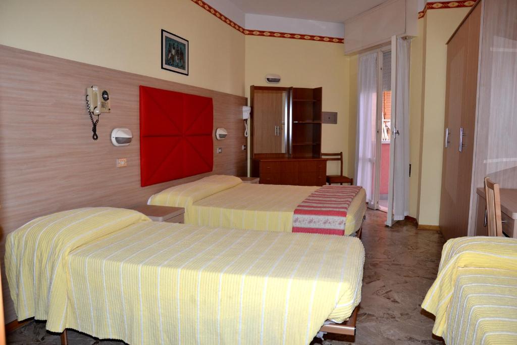 Hotel Marco Polo — Pokoje in Rimini, Emilia-Romania