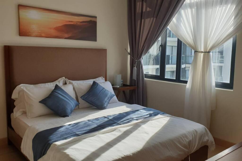 OPAHOME@ Timurbay Seafront Residence 2BR Family suite Seaview and Poolview photo
