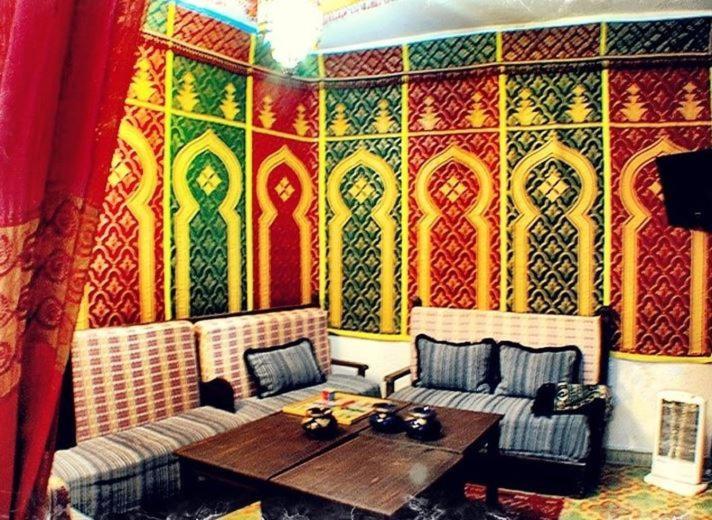 Shared lounge/TV area, Riad Assilah Chaouen in Chefchaouen