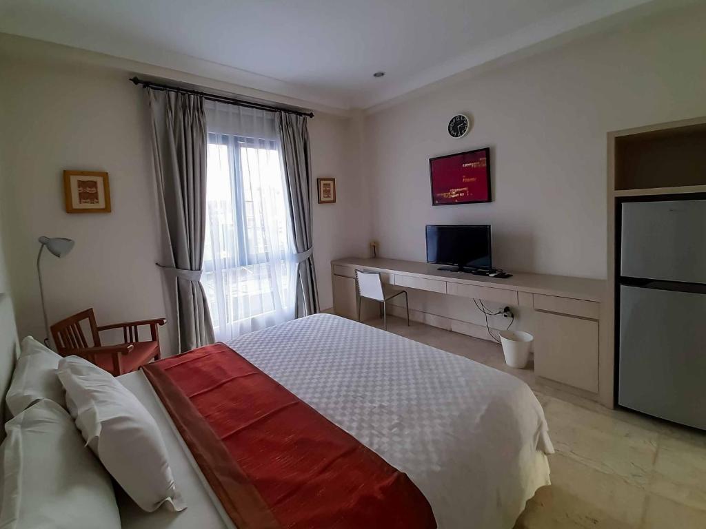 Guestroom, Bangka Suite Mitra RedDoorz in Jakarta