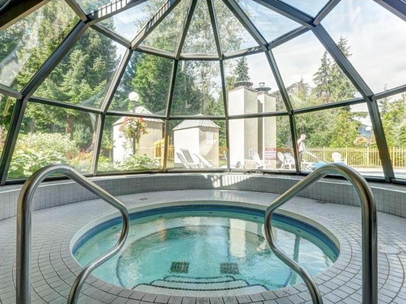 Ski In Ski Out Apartment with Pool and Hot Tub by Harmony Whistler photo