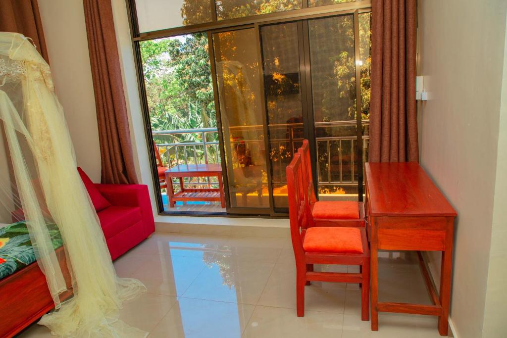 Kitano Tours and Safaris - KILIMANJARO WHITE HOUSE HOTEL - Tanzania Serengeti safari & Mount Kiliman photo