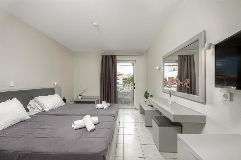 Poseidon Beach Hotel — Hotel rooms in Laganas, Ionian Islands