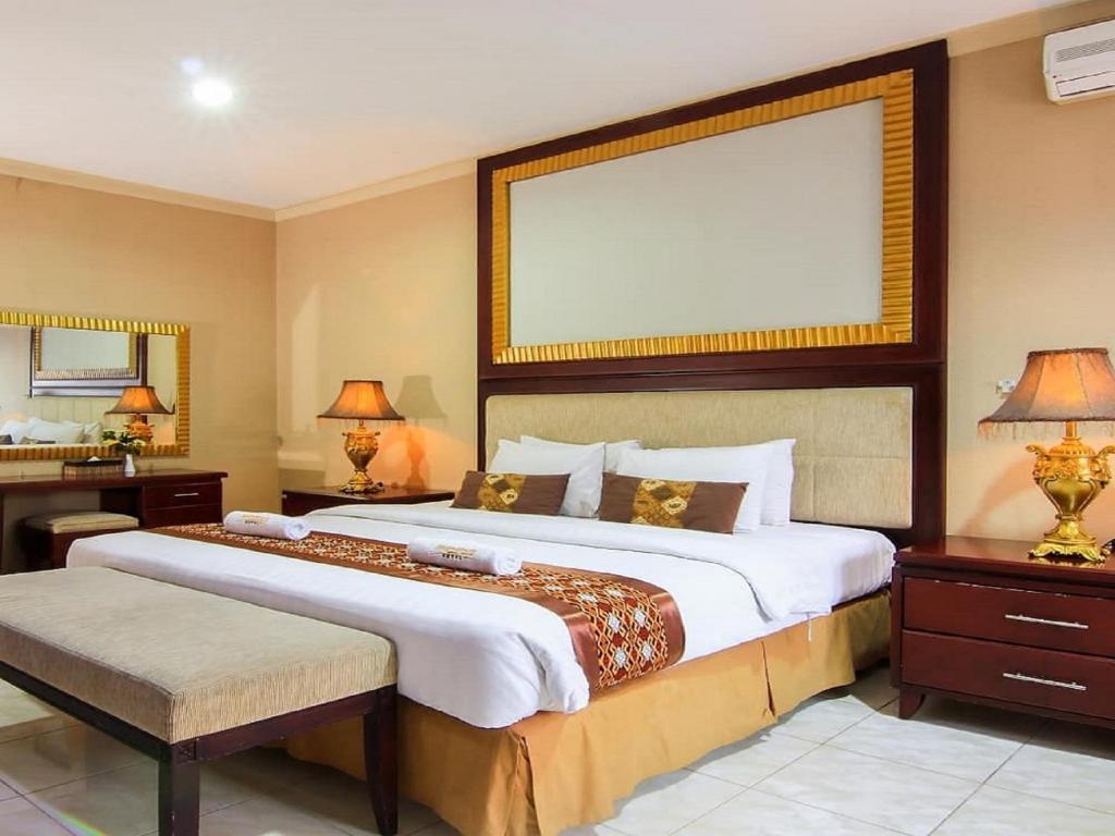 Hotel Signature Mandala Kencana photo