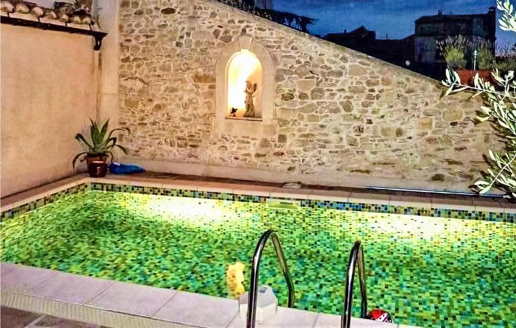 Awesome home in St Laurent des Arbres w/ Outdoor swimming pool and 4 Bedrooms