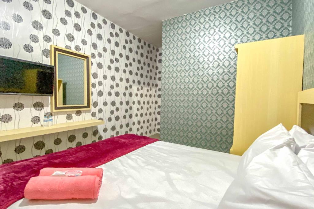 Tini's Guest House Malang RedPartner photo