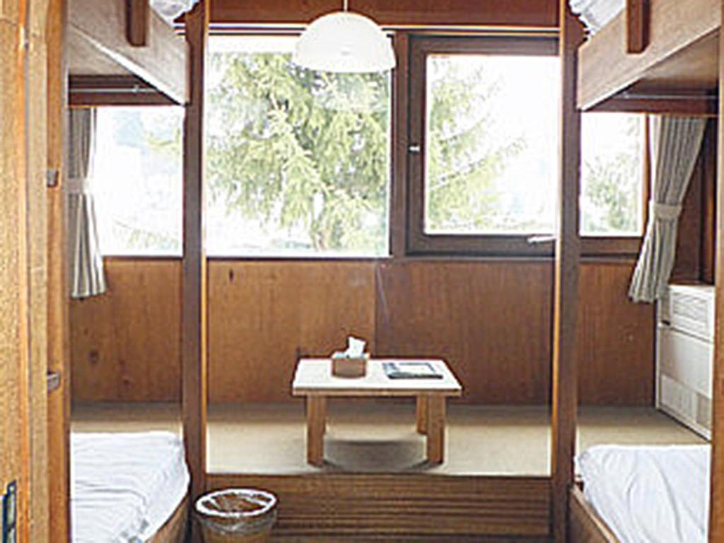 Room with Bunk Beds and Shared Bathroom 