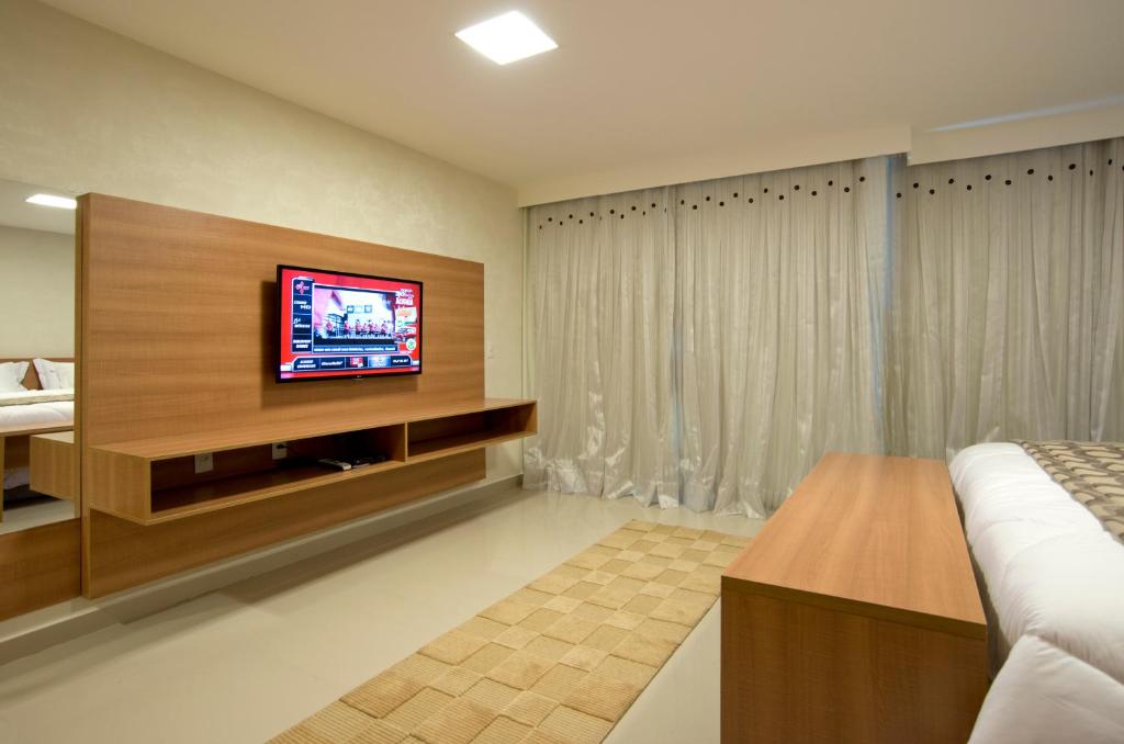 Apartamento Deluxe com Varanda