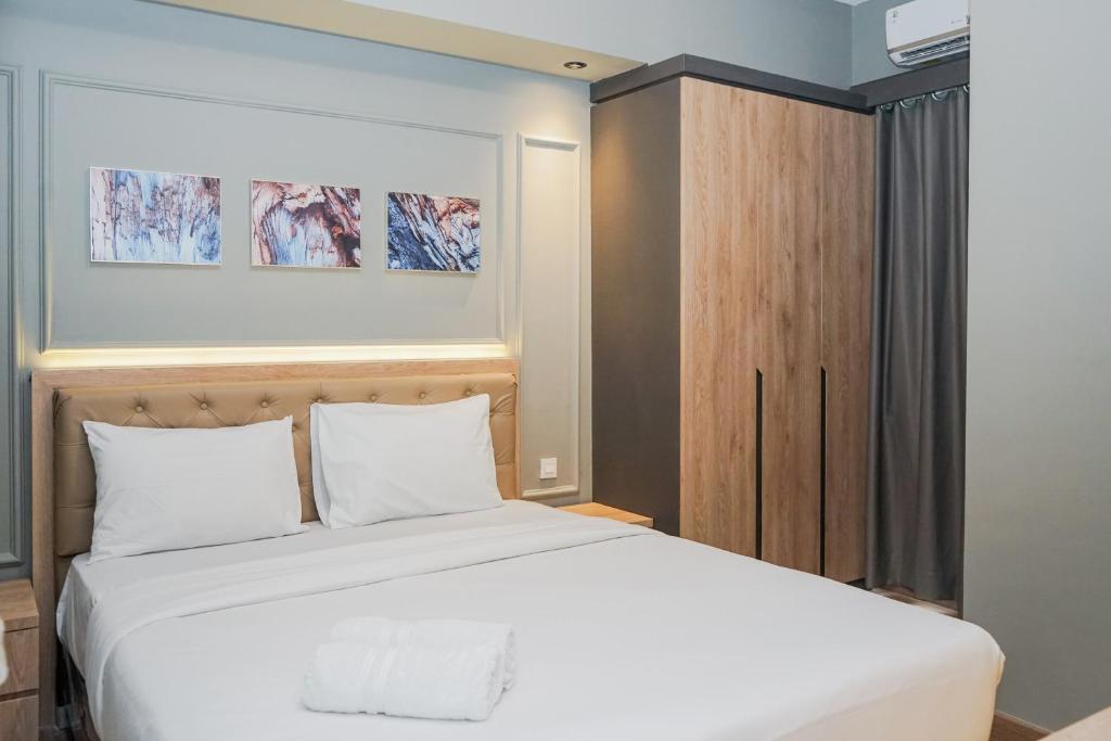 Comfortable and Homey 2BR Apartment at M-Town Residence By Travelio, Tangerang