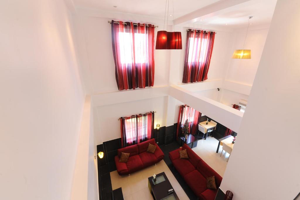 Shared lounge/TV area, Inn Luanda in Luanda