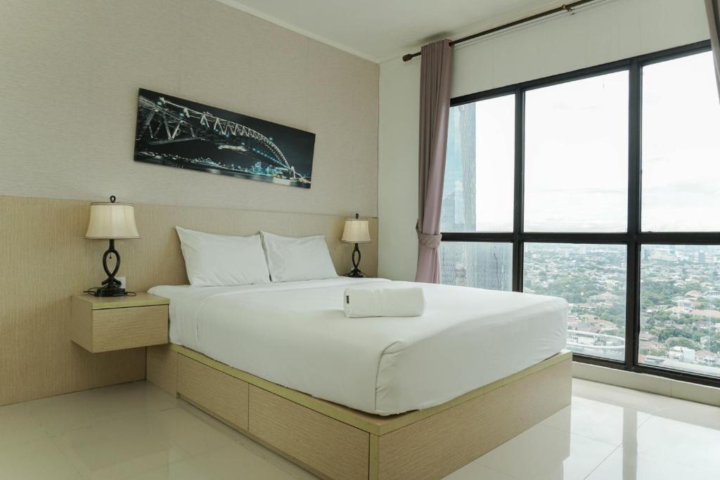 Modern Style 2BR at Tamansari Semanggi Apartment By Travelio, Jakarta