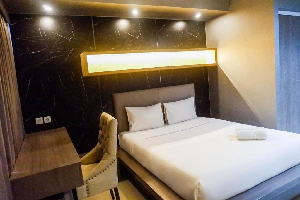 Modern Spacious Studio Room Apartment at Taman Melati Surabaya By Travelio, Surabaja