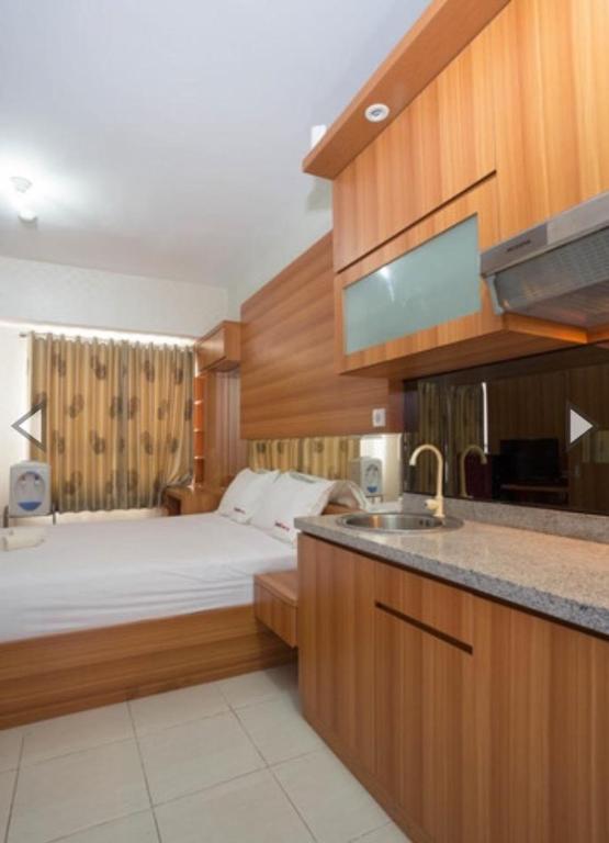 Apartemen Taman Melati  Margonda by Winroom photo
