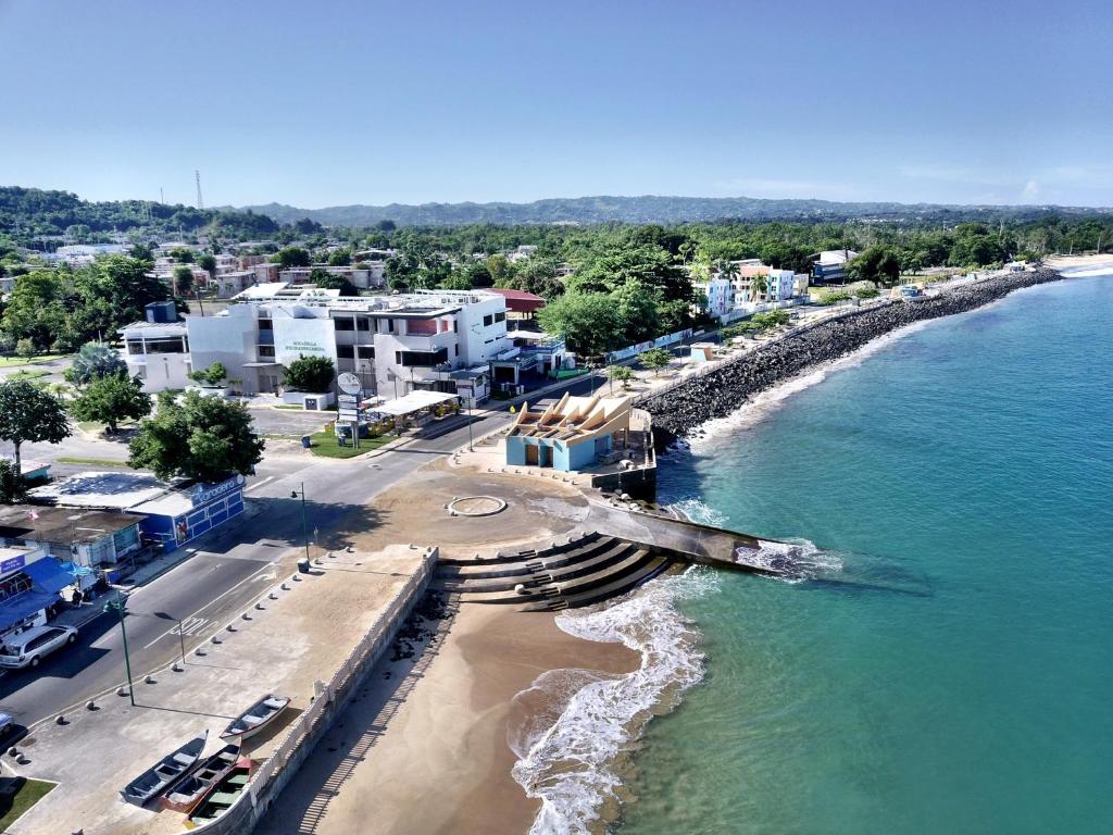 SURFER'S HIDDEN GEM BY THE SEa photo