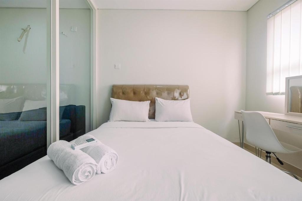 Elegant with Modern Design 1BR Apartment at Atlanta Residences By Travelio, Pondokcina