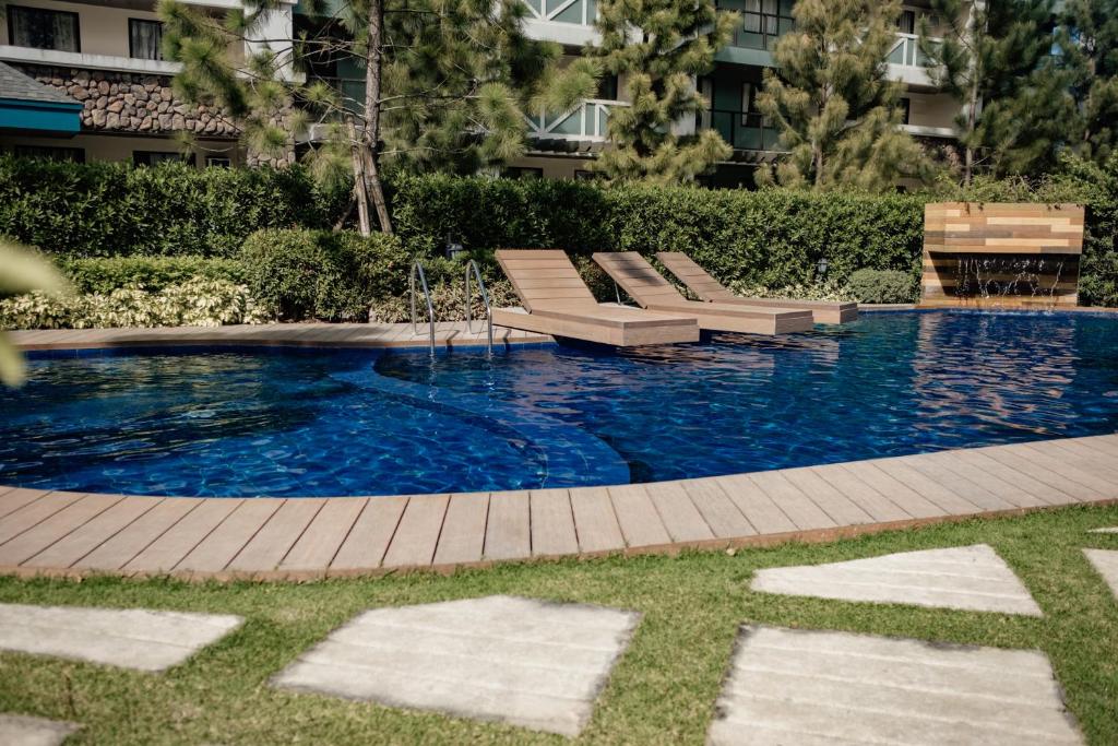 Pine Suites Tagaytay 2 BR w/ Netflix and parking photo
