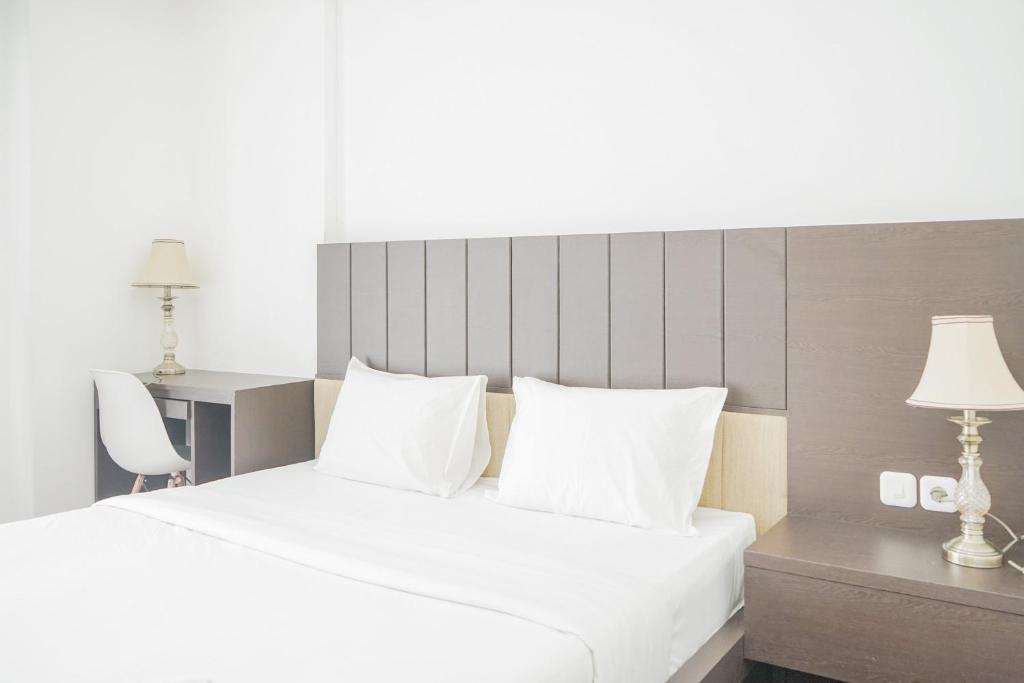 Exclusive Studio Room at Casa De Parco Apartment By Travelio, Samporo