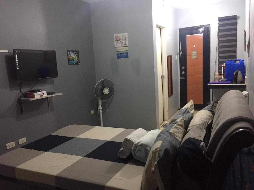 Lucena Meg's Studio Apmnt Deluxe rm-Near SM-Wifi — Hotel in Lucena