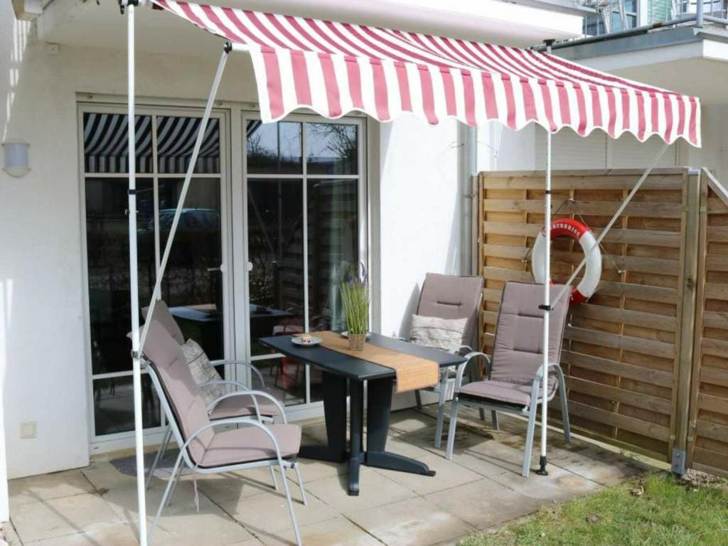 Chic Apartment with Roofed Terrace, Awning, Garden Furniture